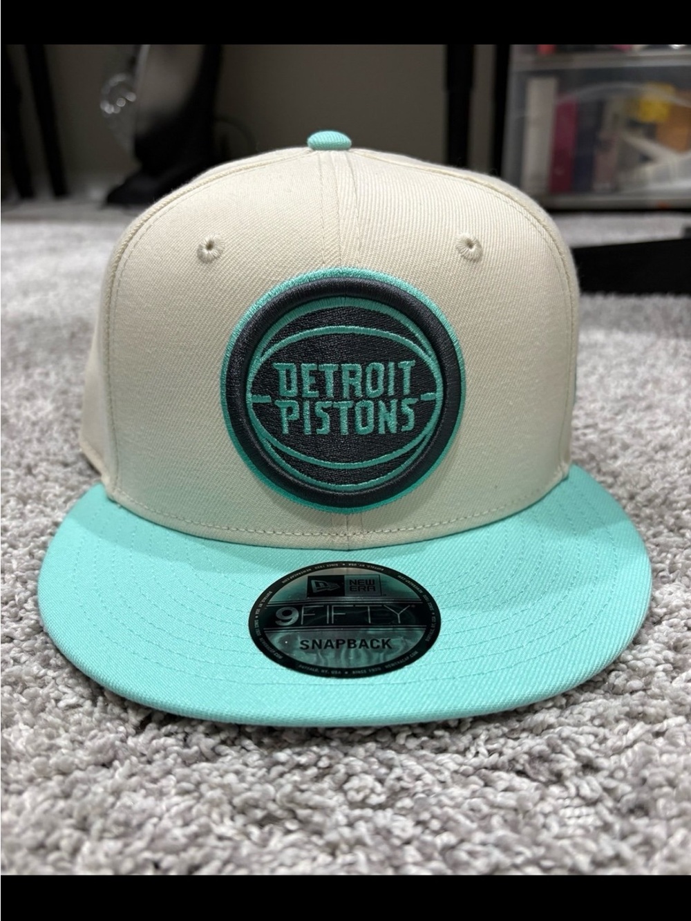 New Era Detroit Pistons Snapback Hat in Cream and Teal